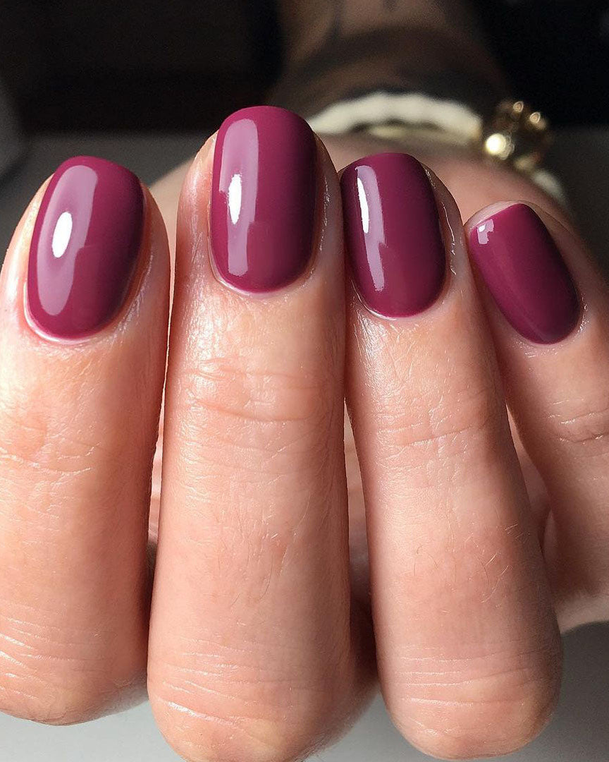 Dark crimson gel nails