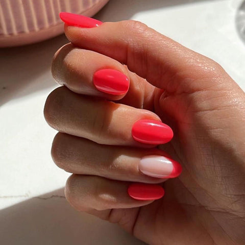 Bright coral nails