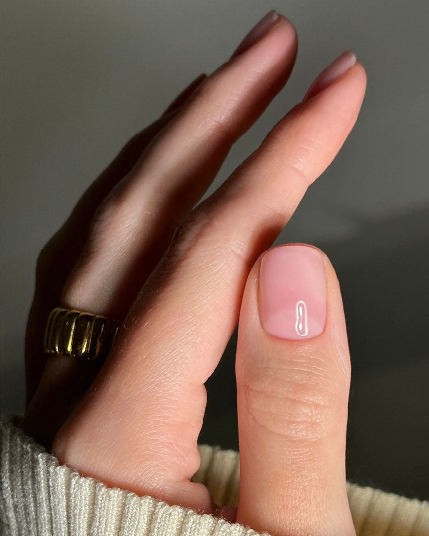 Sheer pink nails