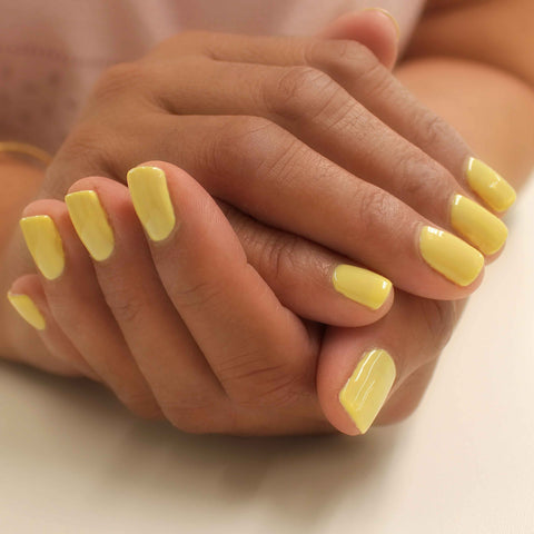 Bright yellow nails