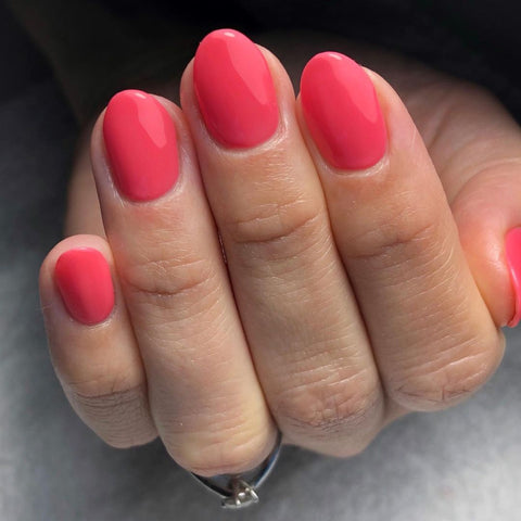 Coral pink nails