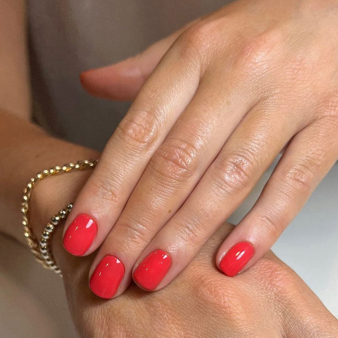 Bright coral nails